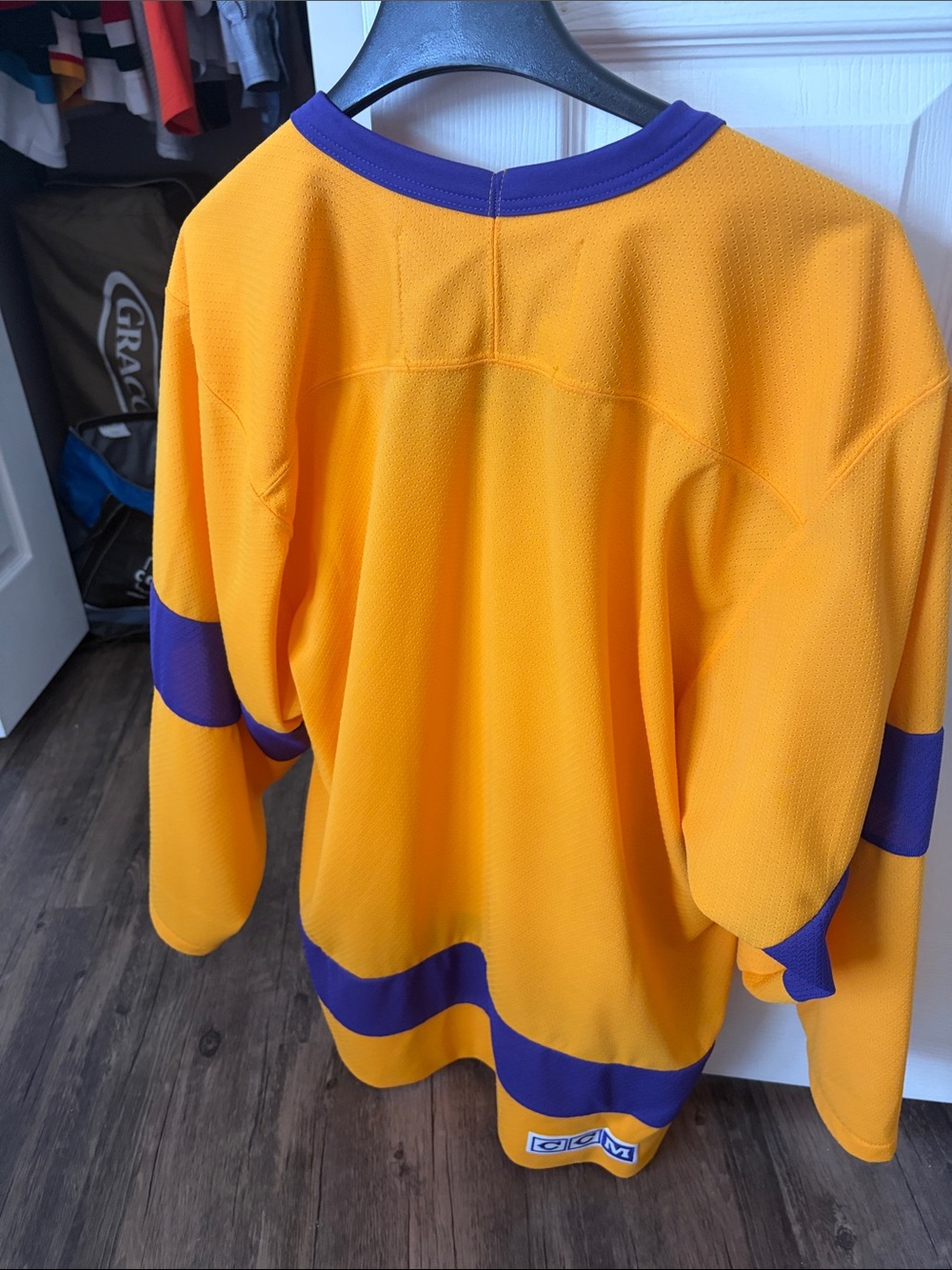 CCM Gold Hockey Jersey with Purple Trim - Picture 2 of 2